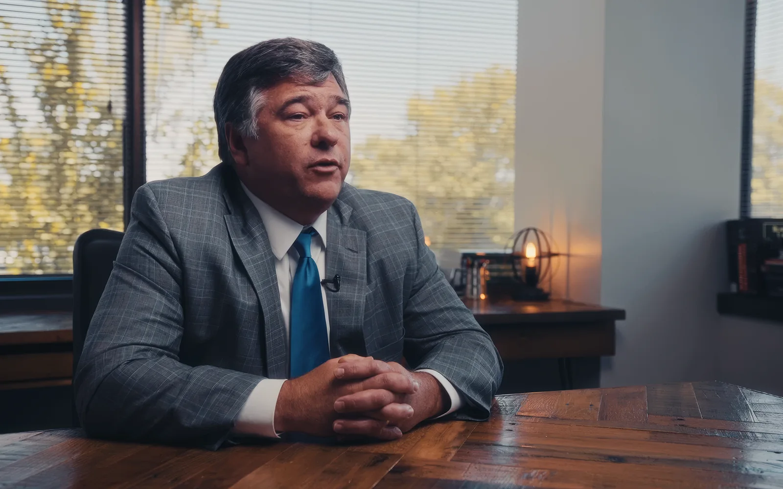 Attorney speaking in a law firm intake meeting during a brand video production