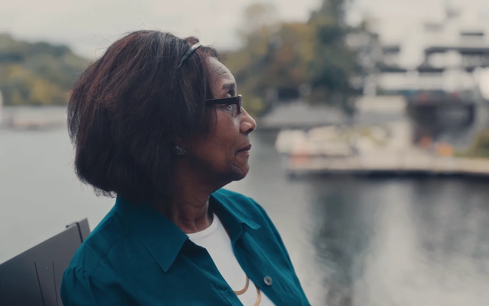 Client close-up near the waterfront for a law firm testimonial video