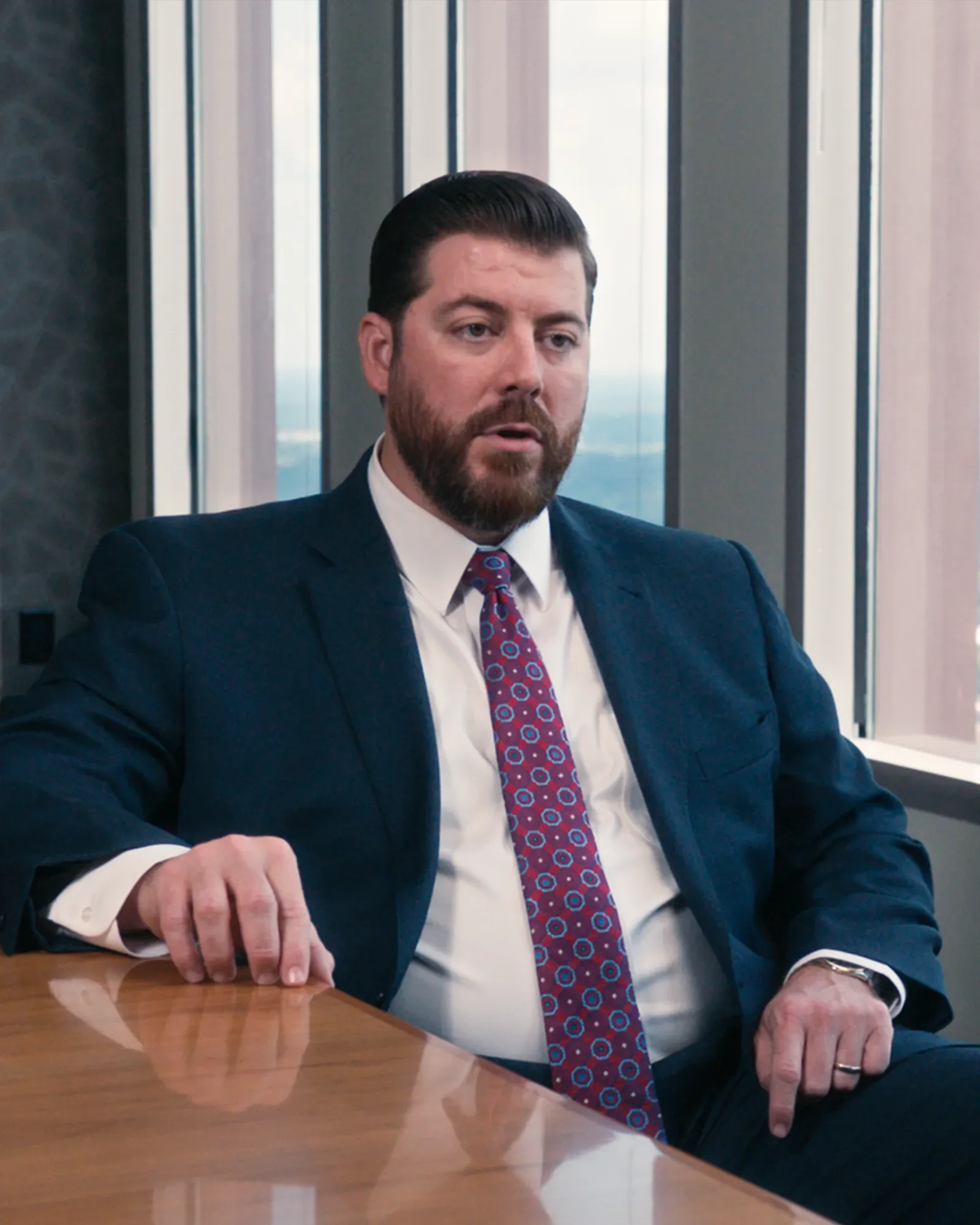 Attorney seated for a law firm profile video interview