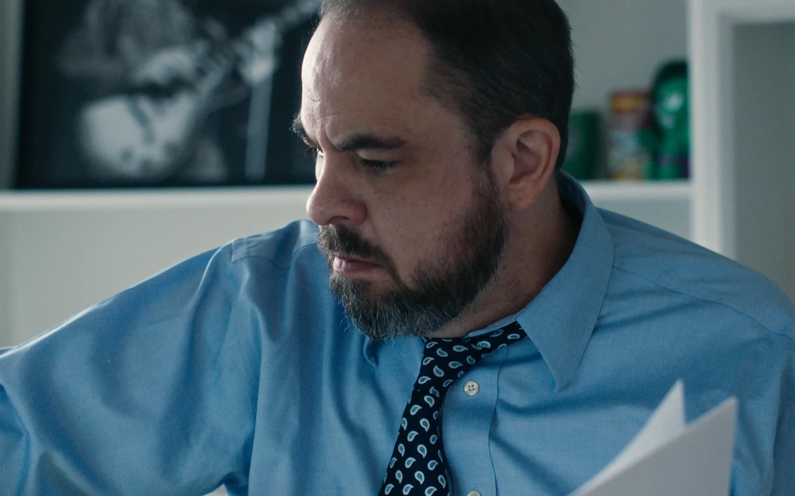 Attorney reviewing legal documents while preparing a practice area video